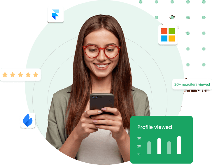 A woman smiling at her phone